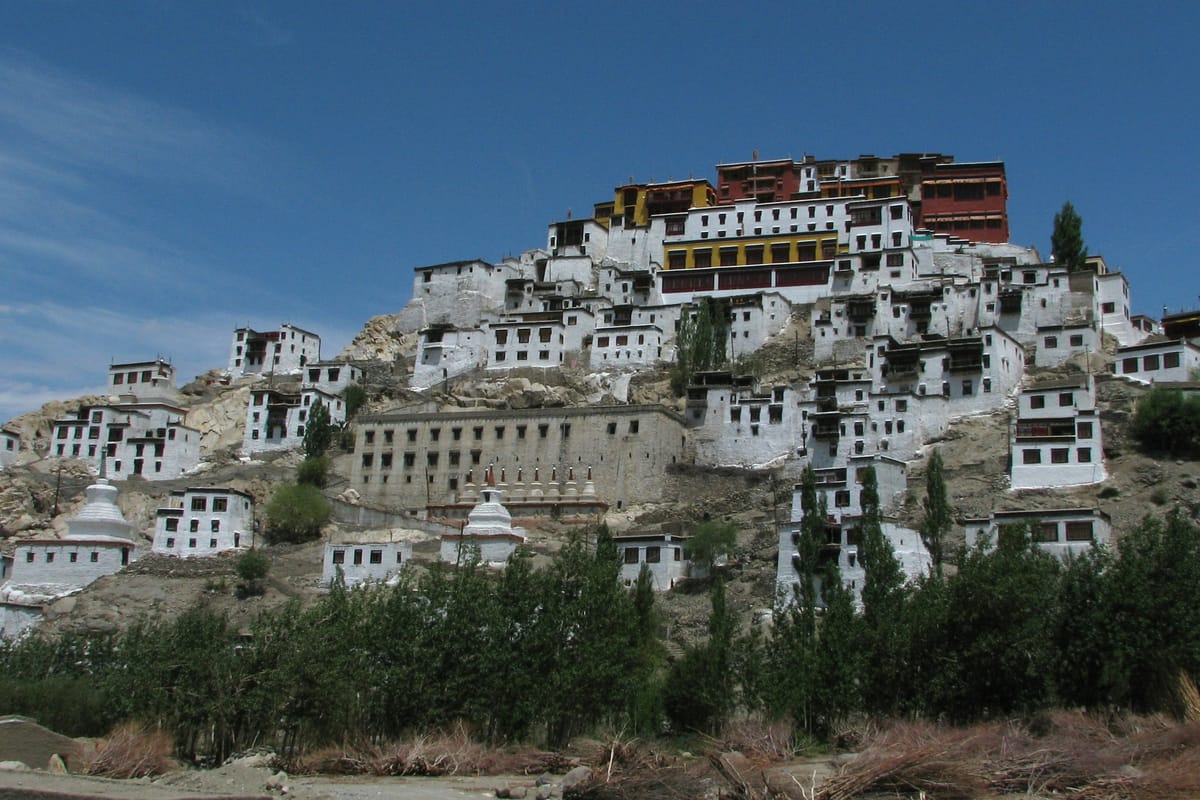 Thiksey Monastery rising above the Indus Valley, its multi-storey whitewashed buildings stacked on a rocky hill are often compared to Tibet's Potala Palace